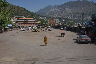 explained   the clashes in pok over the 12  refugee  seats