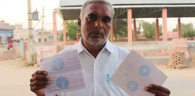 why is sbi transferring farmers  insurance claims to their savings accounts without their consent 