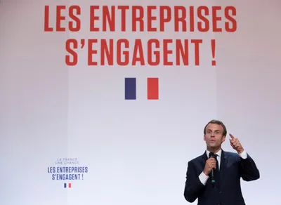 france s macron under fire after aide caught beating may day protester