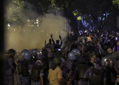 instead of running  the protesters dare the police with undaunting courage