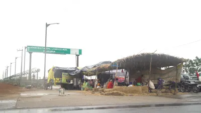 protesting farmers celebrate a win as adani facility shuts down in ludhiana