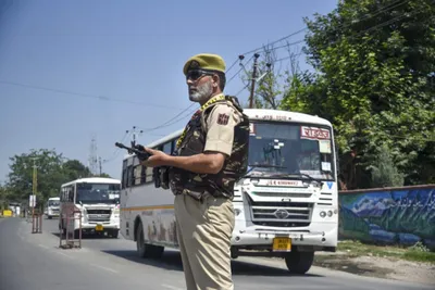  we are being treated as if we are standing with guns   do restrictions ensure security in kashmir 