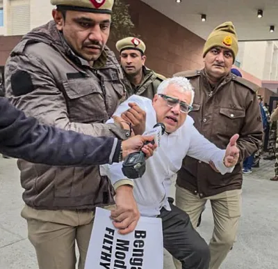 ‘arrogance in uniform ’ says mamata banerjee as police detain tmc mps protesting outside shah’s office