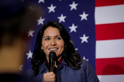 tulsi gabbard ends democratic presidential bid  endorses biden