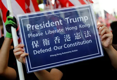 hong kong protesters call on trump to  liberate  city