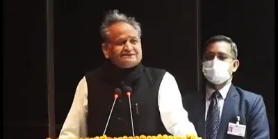 rajasthan  at function  teachers tell cm they have to pay money for transfers