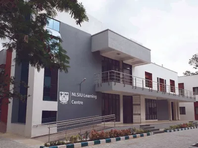 time for nlsiu to change its  dharma rakshati rakshataha  motto