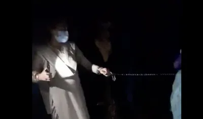 after baby dies in detention centre  rohingya family brought to last rites in handcuffs