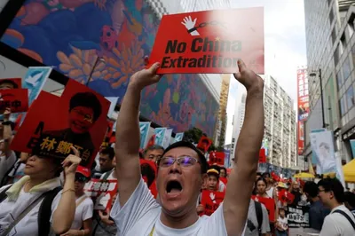 hong kong leader defiant as city gears up for fresh protests and strikes