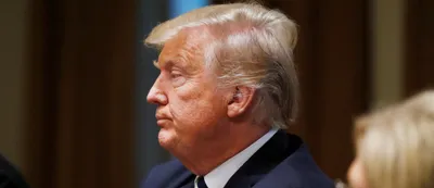 facing political backlash over putin summit  trump says he  misspoke 