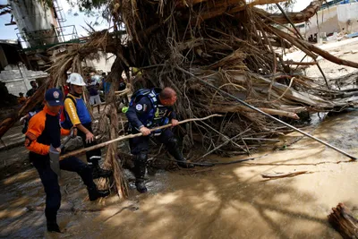as floods tear through venezuela  dozens dead  hundreds displaced
