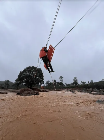 cars hanging from trees  bodies washing ashore  amidst devastation rescue efforts on at wayanad