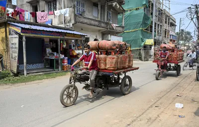 union govt cuts subsidised lpg refills under ujjwala scheme from nine to four