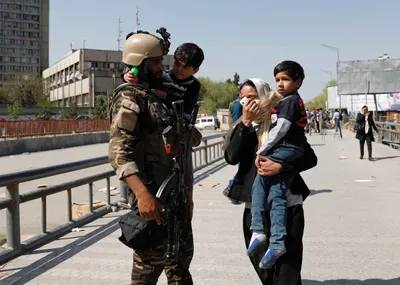 seven killed in attack on afghan communications ministry in kabul