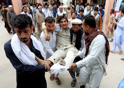 carnage at afghan election rally as suicide bomber strikes  at least 13 dead